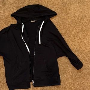 Three quarter sleeve jacket with hood and zipper